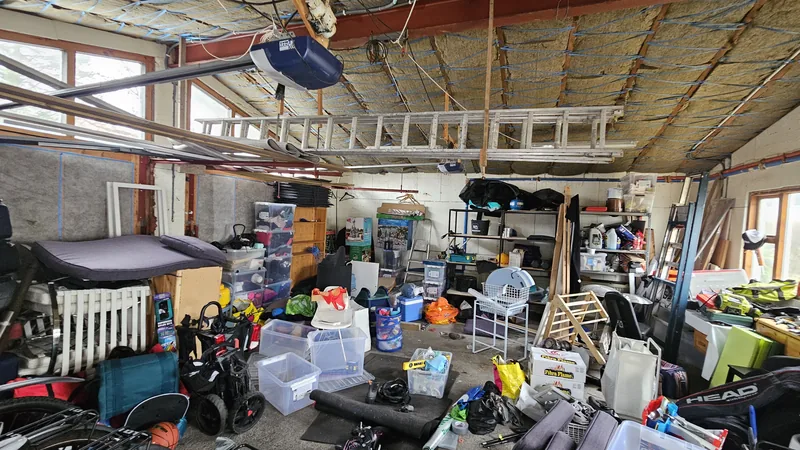A garage full of storage before the conversion began