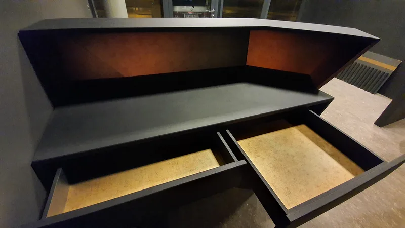Black custom desk with gold details
