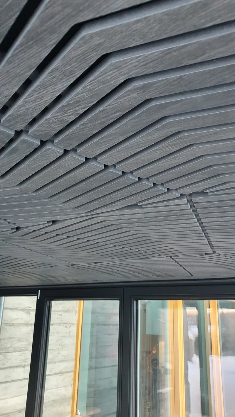Custom CNC-routed acoustic ceiling panels